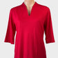 Hedrena Wool top in cherry red with notched neck and elbow length sleeves for smart casual or office wear