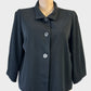 Ignazia black single breasted jacket with convertible collar and three quarter sleeves for office wear.