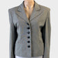 I.Q. Trademark single breasted jacket in black and white houndstooth with six button closure for office wear.