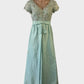 Vintage designer Jinoel of Melbourne gown in blue shantung with lace bodice, v-neck, decorative bow and pleated skirt for formal wear.