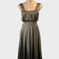 Designer Joseph sleeveless A-line dress in bronze satin finish with pleated bodice and sash for evening wear.