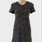 Ju's shift dress in black knit with appliqué ribbon, pearl-beaded trim and round neck for office or events.