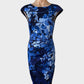 Designer Karen Millen sleeveless sheath dress in blue floral print with bateau neck, ruched waist, and pencil skirt for office wear