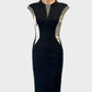 Karen Millen sleeveless sheath dress in black and white ribbed weave with satin and mesh inserts for evening or formal wear.