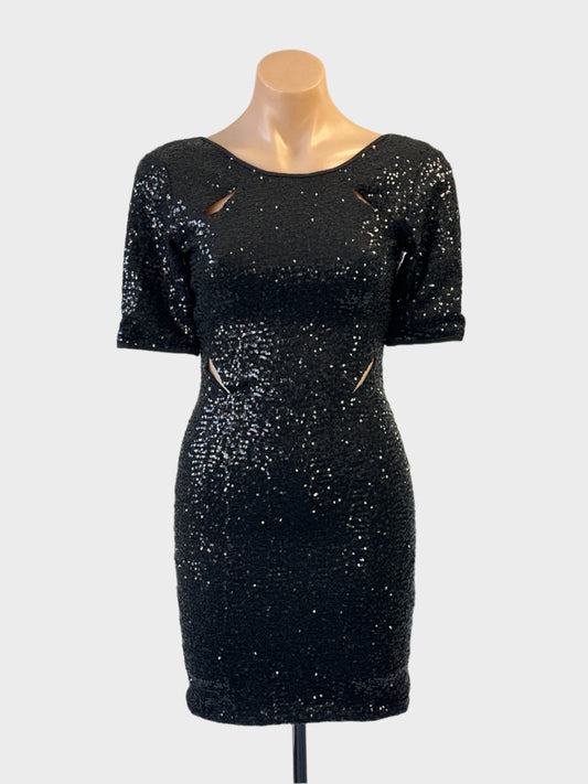 Designer Keepsake bodycon dress in black with slash eyelets and scoop back for evening wear.