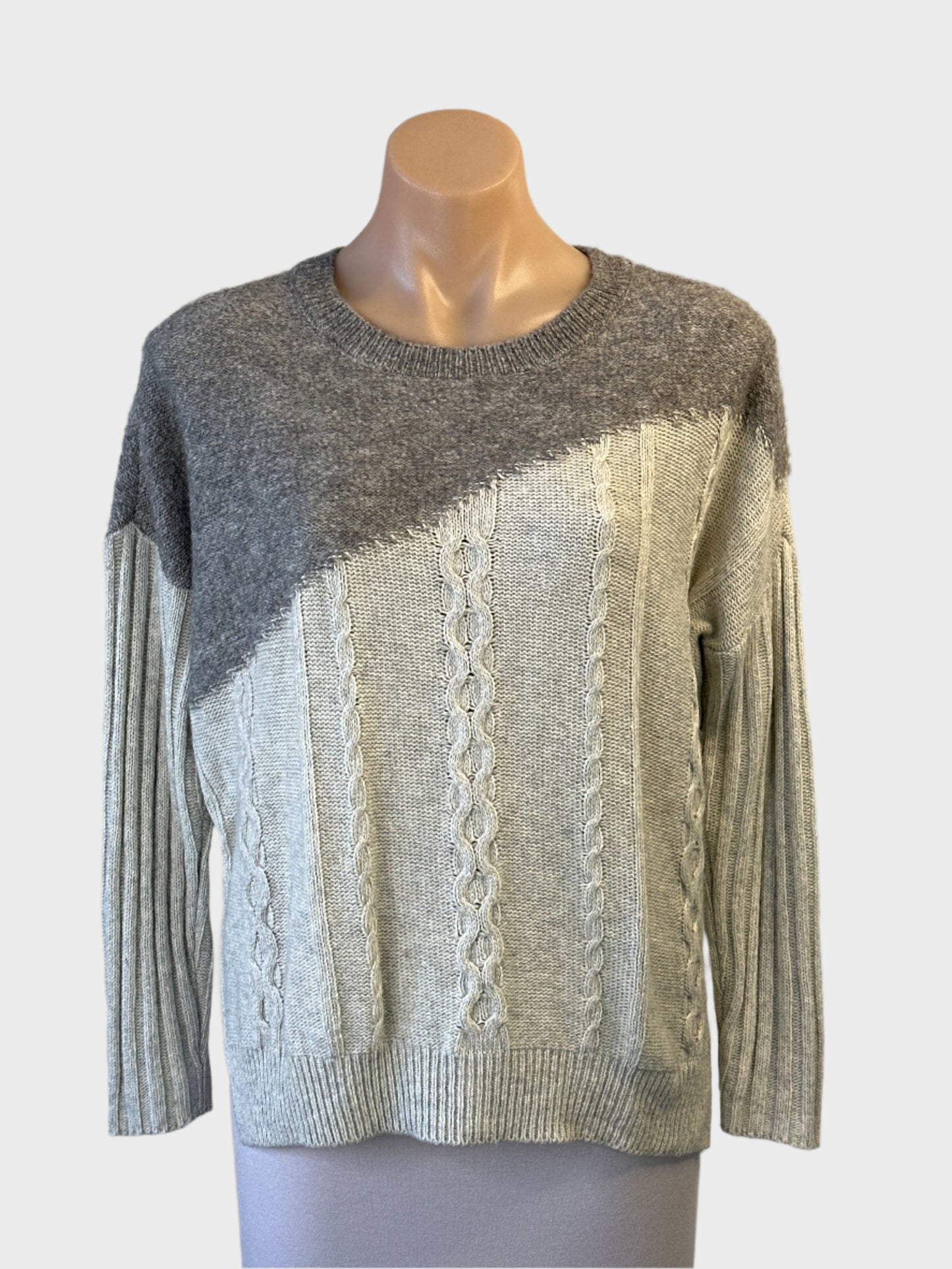 Designer Lania The Label sweater in dove grey with mid grey contrast, long sleeves and cable knit front for casual wear.