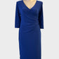 Designer Leina Broughton sheath dress in blue jersey with ruched waist for special events or evening wear.