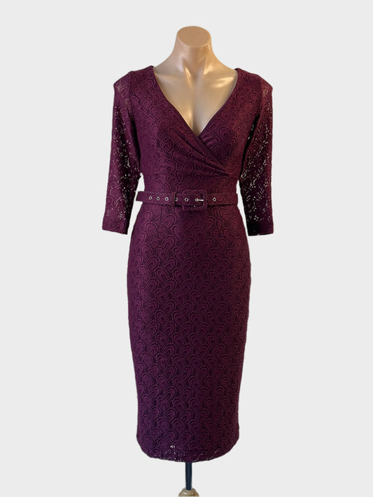 Designer Leona Edmiston sheath dress in red knit lace with surplice neck and matching belt for office wear.