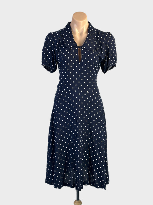 Lily Whyt A-line dress in navy blue with puff sleeves and flared skirt for office or smart casual wear.
