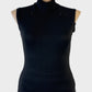 Designer Lisa Barron turtle neck top in black fine rib knit with shoulder zips for office or evening wear.