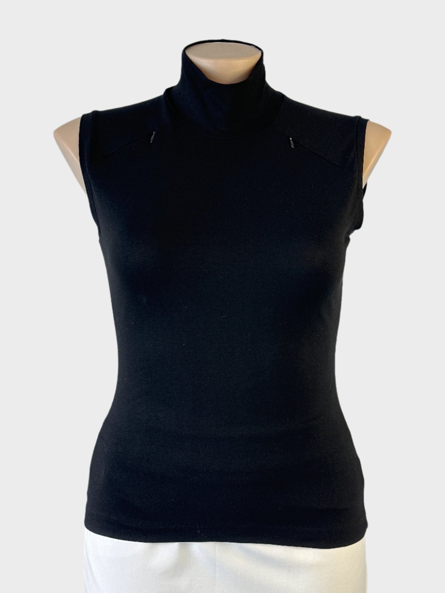 Designer Lisa Barron turtle neck top in black fine rib knit with shoulder zips for office or evening wear.