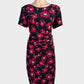 Liz Jordan black and red sheath dress in jersey with poppy print, ruched waist and straight skirt for office wear.