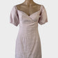 Madison The Label off the shoulder dress in pink linen cotton blend with puff sleeves, surplice neck and straight skirt for special events or smart casual wear.