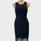 Designer Maje sheath dress in black with mesh yoke and jersey waistband for formal wear.