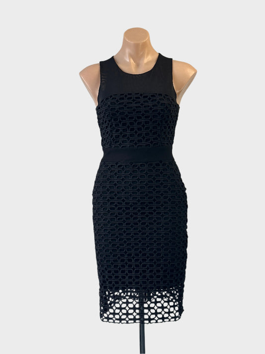 Designer Maje sheath dress in black with mesh yoke and jersey waistband for formal wear.