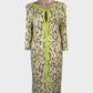 Designer Marc Cain jersey midi shift dress in green with botanical print, keyhole neck and contrasting centre front trim for office or special events.