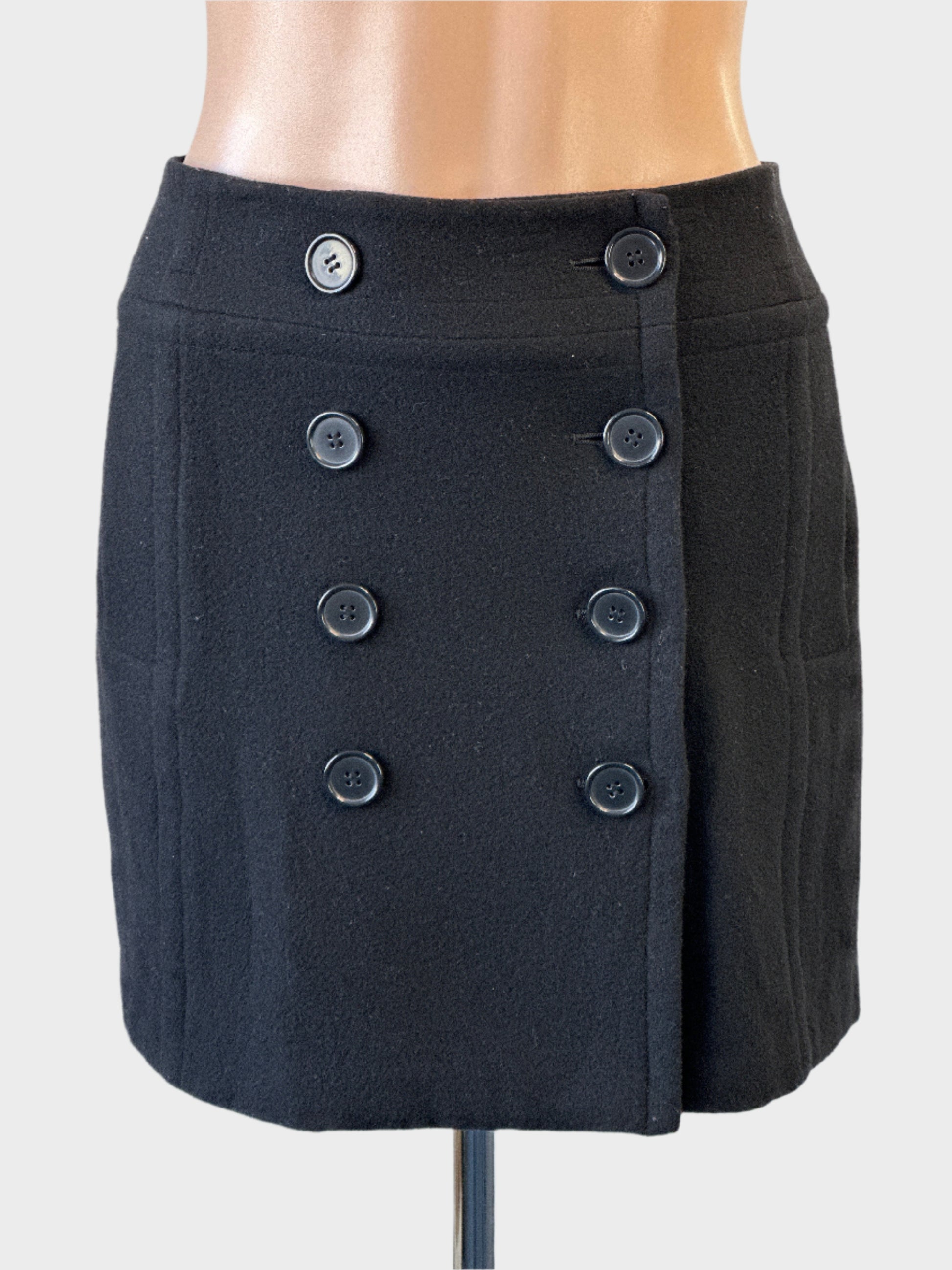 MARCS black wool blend retro 60's hip skirt with button front and welt pockets for smart casual wear.