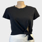Mia sleeveless t-shirt top in black jersey with side hip tie for sporty luxe or resort wear.