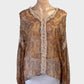 Miss June boho style tunic top in ochre chiffon with frill trim, metallic accents and long sleeves for resort or smart casual wear.