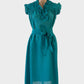 Vintage Modele Jacqui day dress in teal slub weave with pleated yoke, frilled cap sleeves and waist sash for business or smart casual wear.