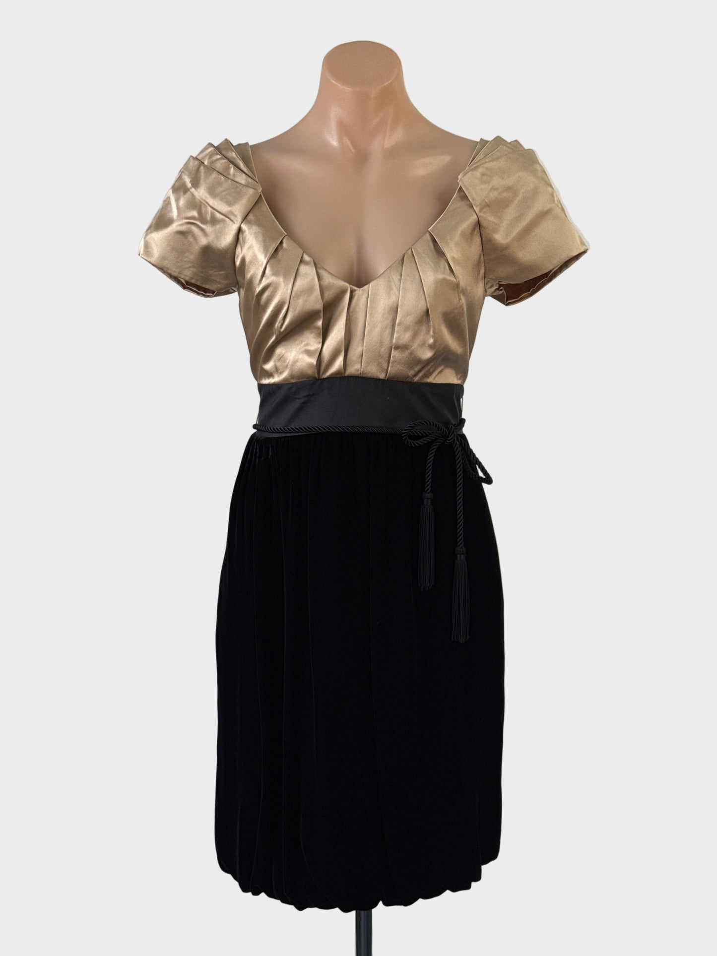 Designer Monsoon London black velvet and gold satin bubble dress with pleated v-neck and contrast sash for formal or evening