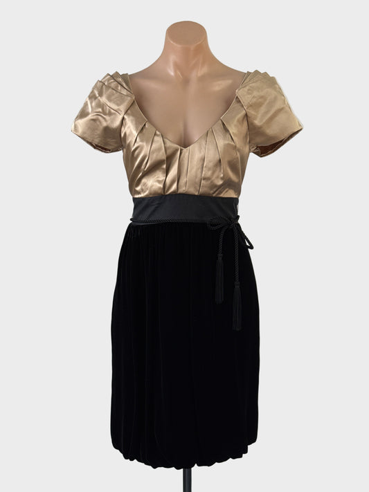 Designer Monsoon London black velvet and gold satin bubble dress with pleated v-neck and contrast sash for formal or evening