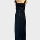 Mr K empire waist gown in black with guipure lace bodice and split skirt for formal wear.