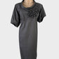 Designer Muccia steel grey asymmetric shift dress in cotton with appliqué balls, scoop neck, and empire waist for office wear.