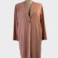 Designer naïf duster coat in pink linen blend with narrow lapels and in-seam pockets for office or smart casual wear.
