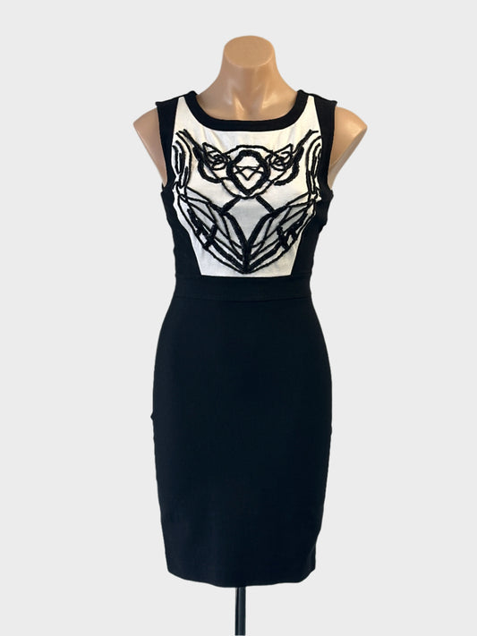 Designer Natasha Gan sheath dress in black and white with beaded bib and back vent for evening or special events wear.