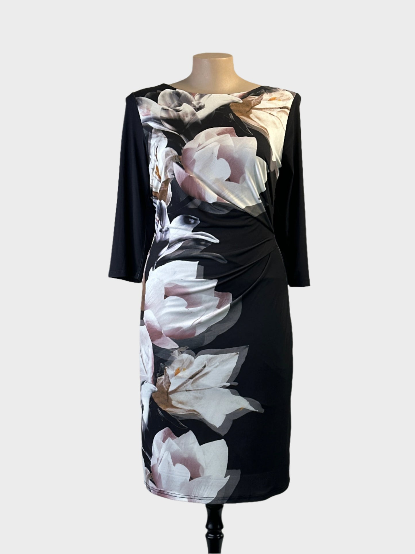 New Cover sheath dress in black with blush and white floral print, bateau neck and draped front for business or evening wear.