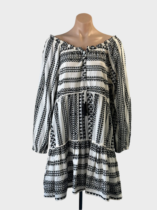 Next black and white boho smock dress in striped weave with pompom trim for resort or smart casual wear.