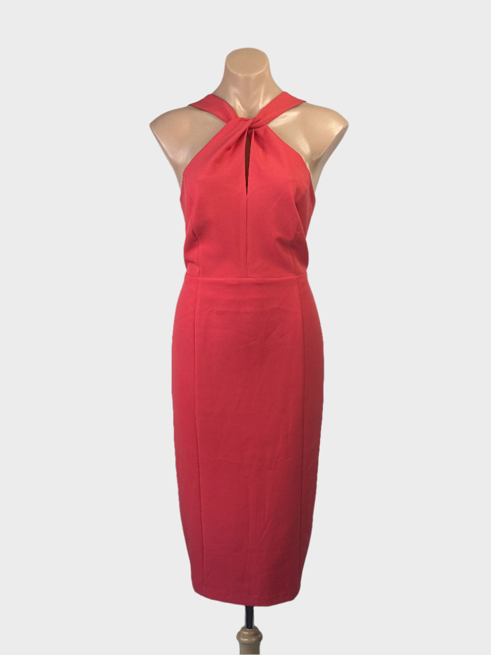 Next coral sheath dress with twisted halter neck, front keyhole, open v-back and pencil skirt with back vent for special events