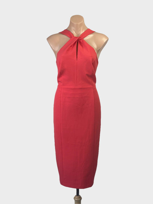 Next coral sheath dress with twisted halter neck, front keyhole, open v-back and pencil skirt with back vent for special events
