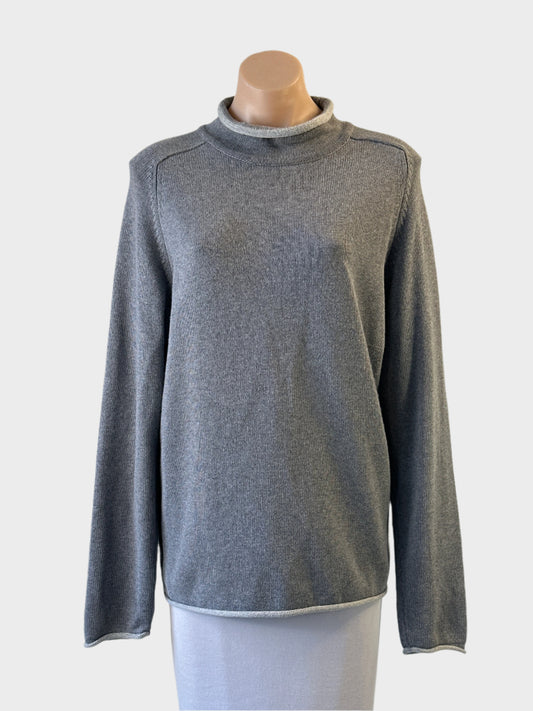 Next sweater in grey variegated cotton with roll neck and raglan sleeves for smart casual wear.