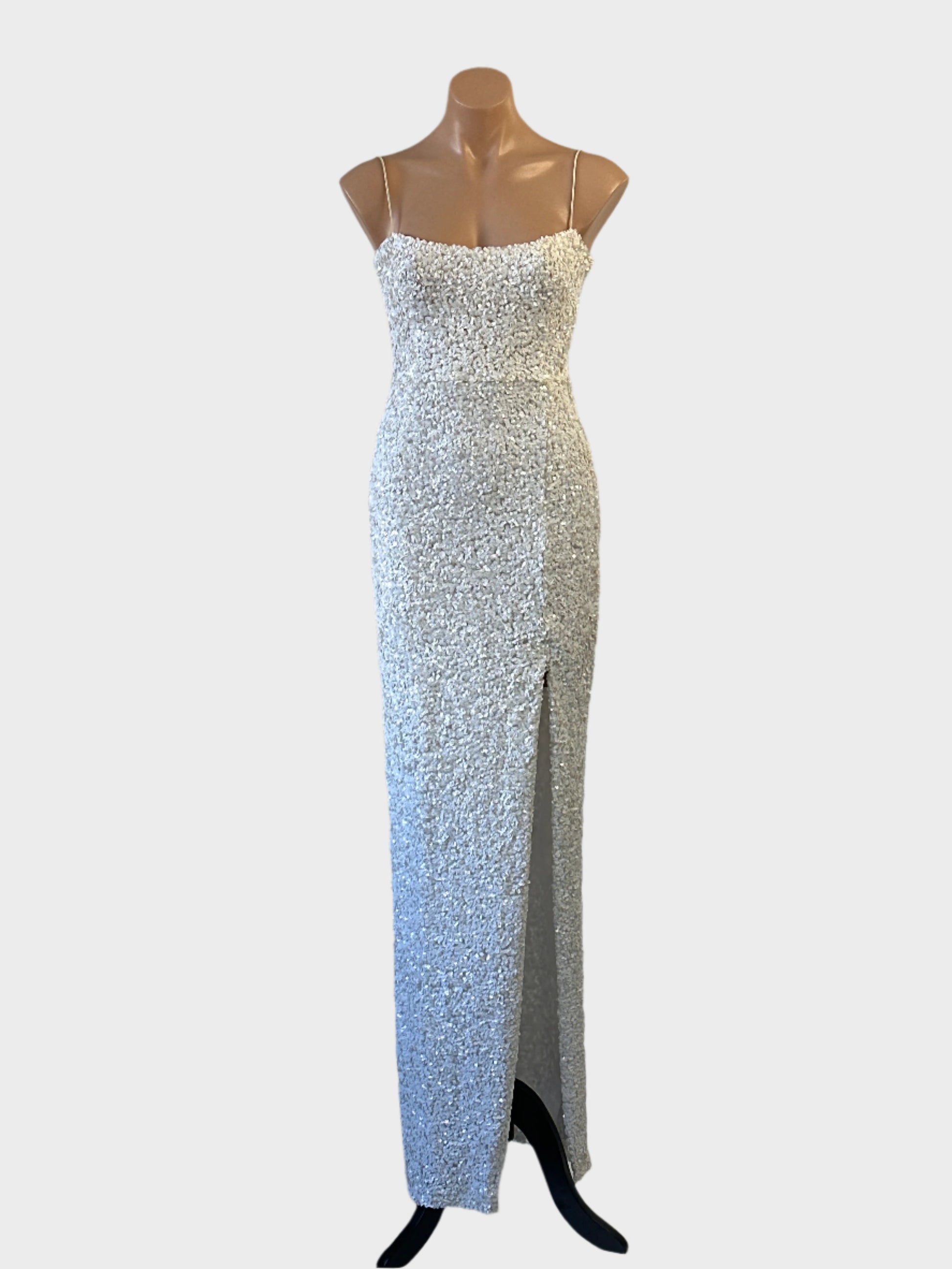 Nookie white fully sequinned sleeveless gown with spaghetti straps and goddess skirt with thigh high split for formal wear.