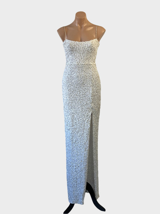 Nookie white fully sequinned sleeveless gown with spaghetti straps and goddess skirt with thigh high split for formal wear.