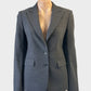 Oxford single breasted jacket in charcoal with wing lapels, button front and flap pockets, ideal for office wear.