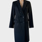 Oxford double breasted reefer coat in black with wing lapels and flap pockets for office wear.