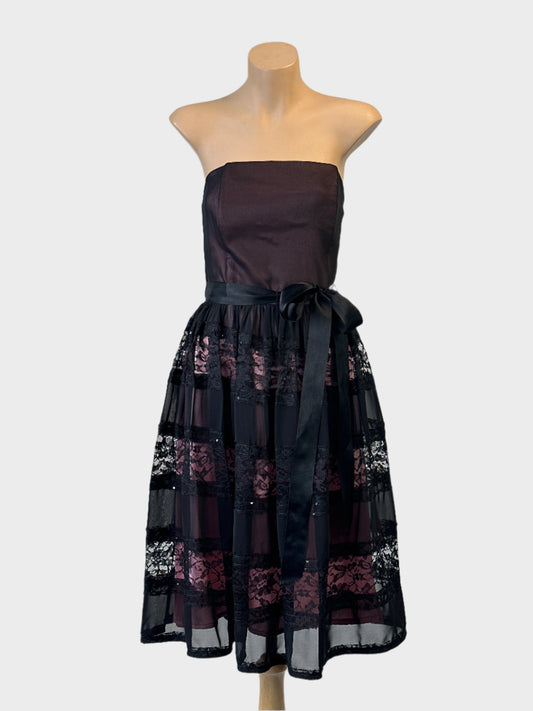 Paco black and pink sheer strapless dress with sequin lace panels and satin sash for evening or formal wear.