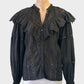 Desisgner Palm Noosa black boho style shirt with guipure lace inserts, broderie anglaise ruffle, and mandarin collar for smart casual wear.