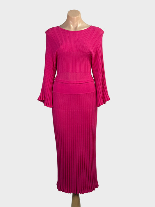 Designer Perri Cutten fuchsia sweater dress in rib knit with bateau neck, fluted sleeves and ribbed column skirt for special events wear