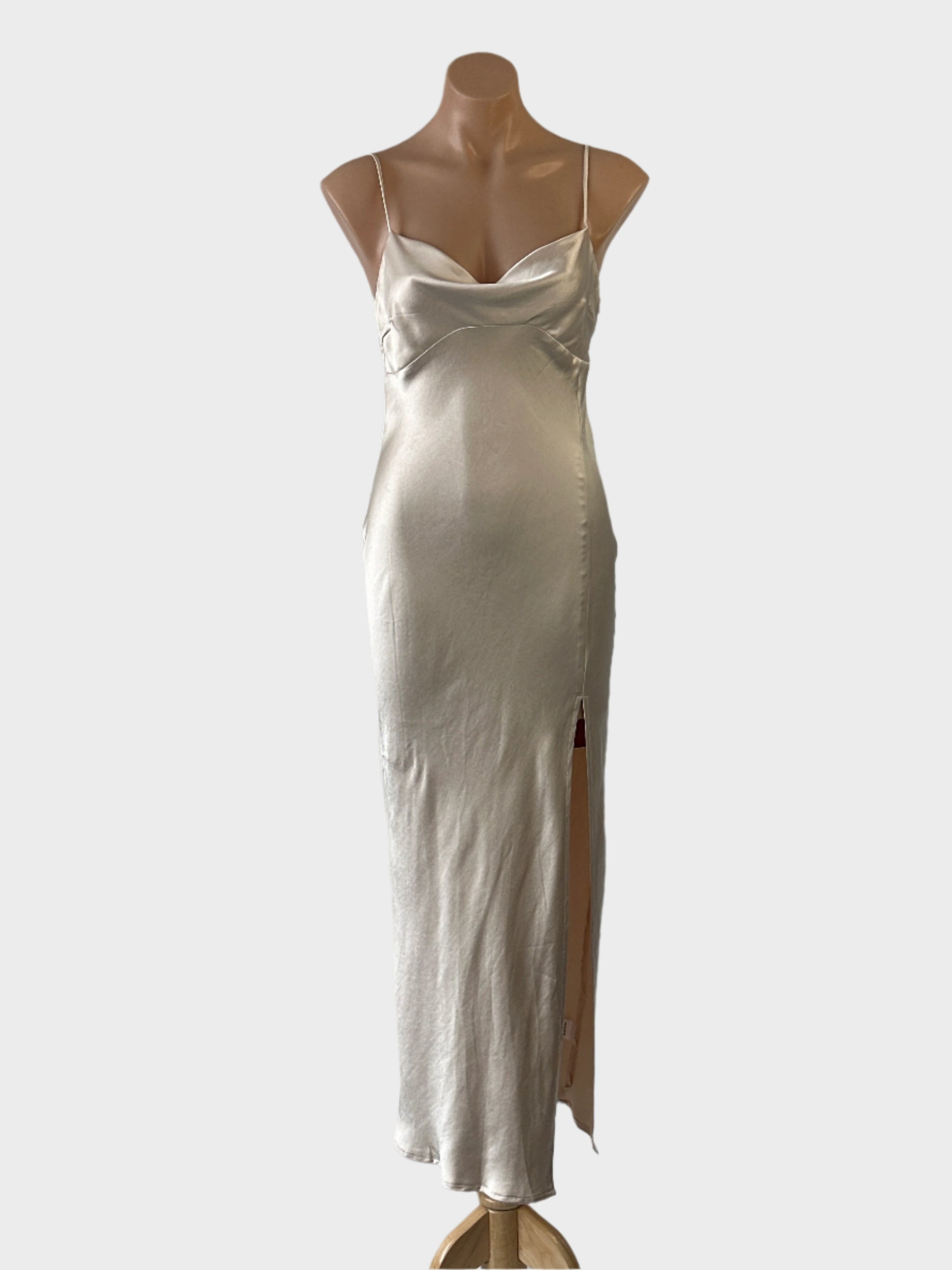 Designer Petal & Pup slip dress in cream satin finish with cowl neck, spaghetti straps and goddess skirt for formal wear.