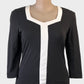 Queenspark black top with square neck and white centre panel, contrast trim and three quarter sleeves for office wear.