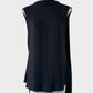 Designer Rachel Gilbert tunic top in black with band collar and open back with pleated tails for evening or special events.