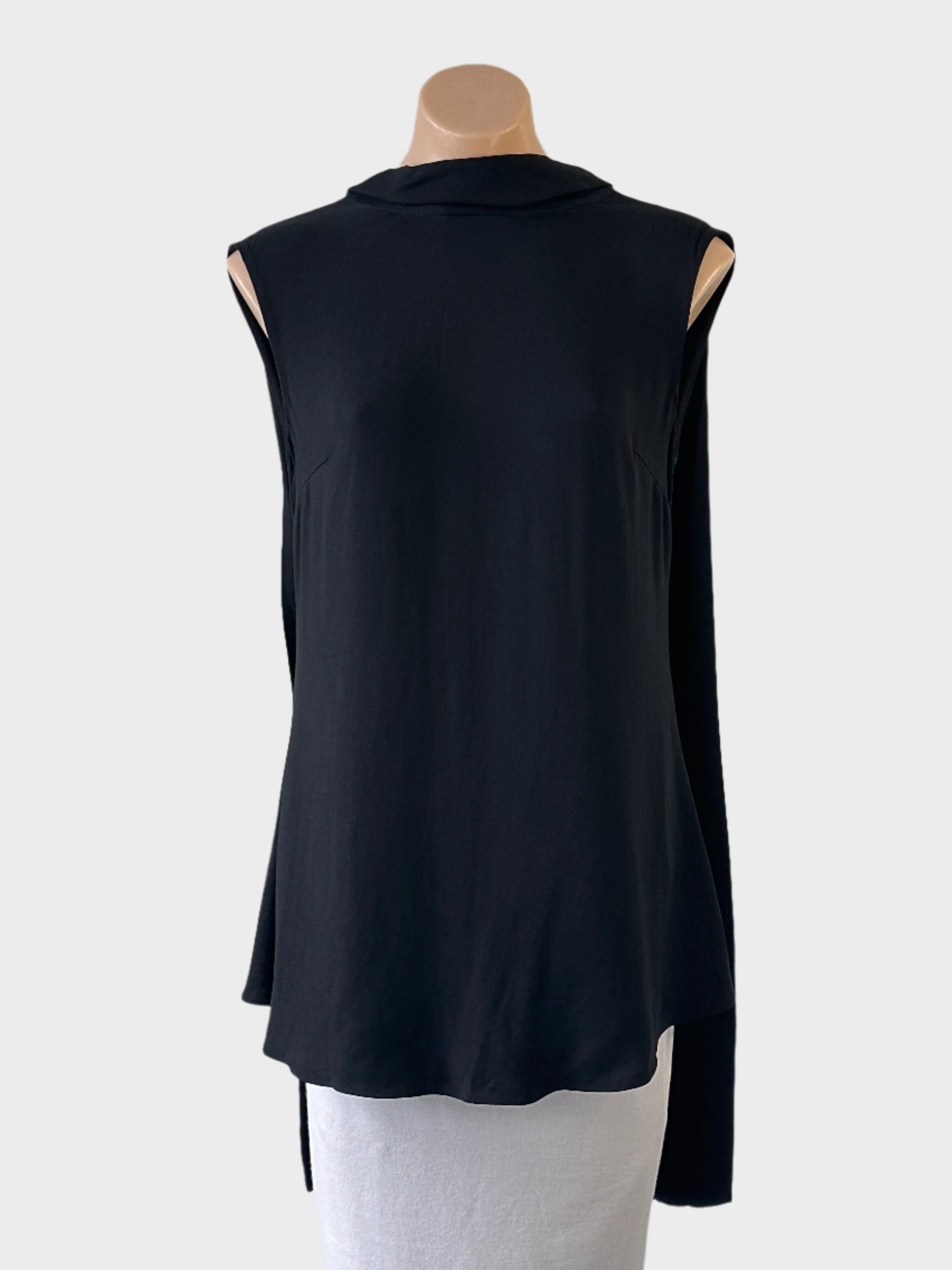 Designer Rachel Gilbert tunic top in black with band collar and open back with pleated tails for evening or special events.