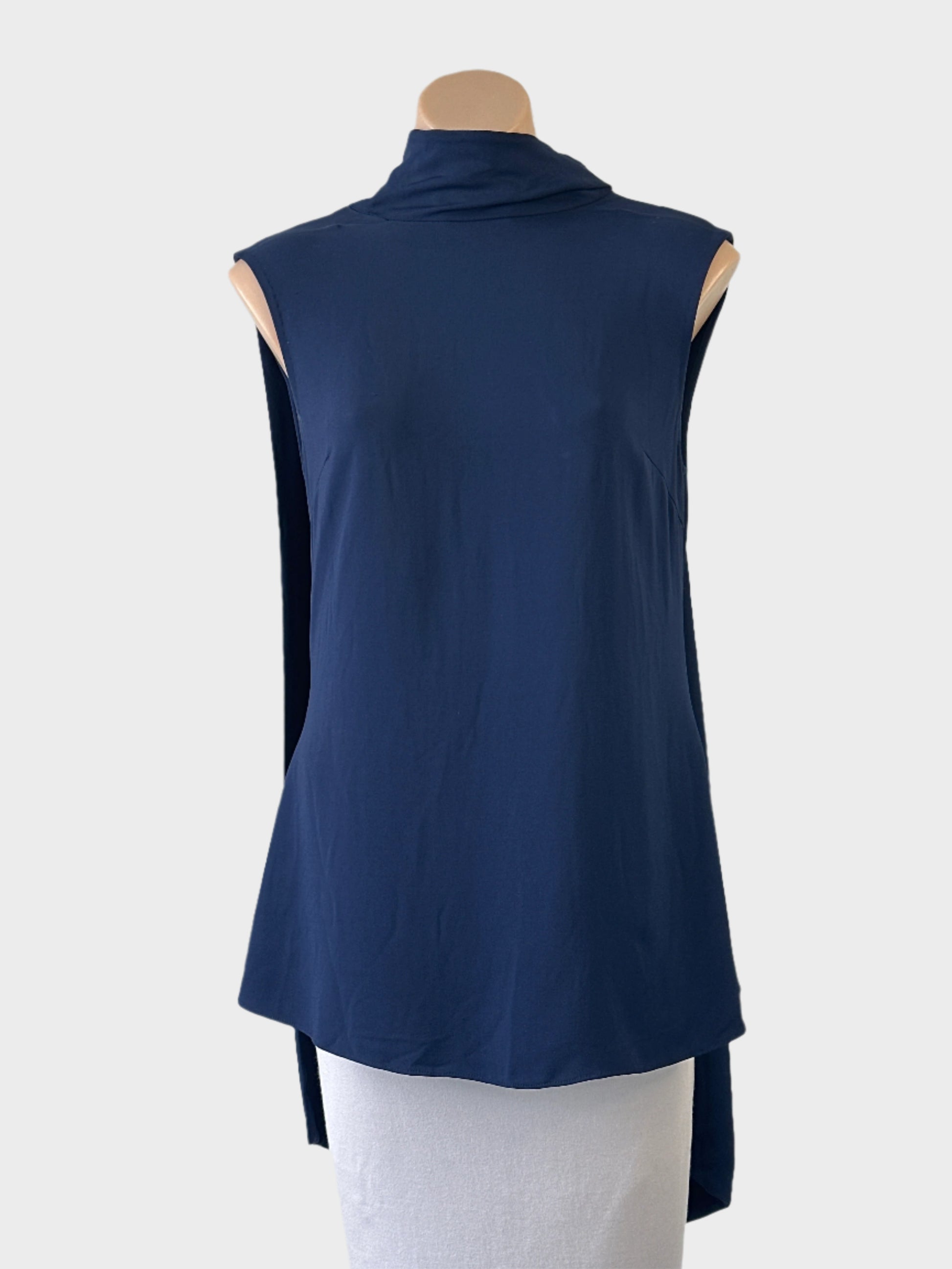 Designer Rachel Gilbert tunic top in midnight blue with band collar and open back with pleated tails for formal or evening wear.