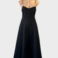 Rebecca Vallance black princess line midi dress with sweetheart neck, spaghetti straps and flared skirt — formal wear.