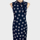 Review blue and pink retro 60's sleeveless shift dress with striped dot print, jabot collar and straight skirt for office or smart casual wear.