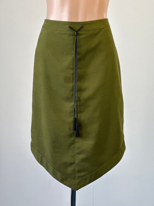 Review green faux suede Native North American inspired skirt with pointed hem for smart casual or office wear.